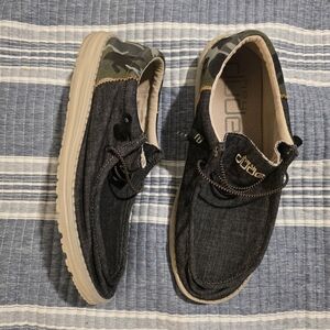 Hey Dude Men's Casual Slip-On Sneakers in Black with Camouflage Trim